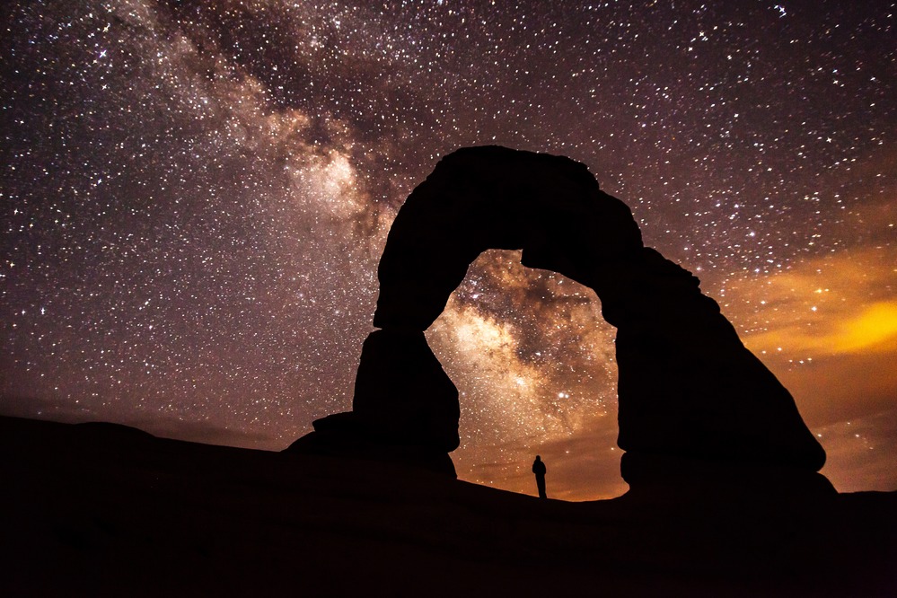 The Milky Way arcing above Delicate Arch at night