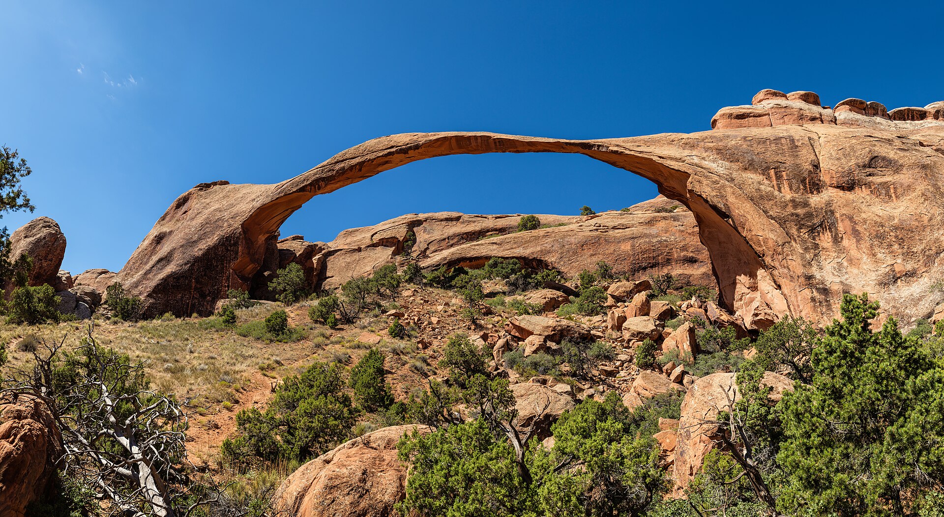 Landscape Arch stretching thinly across the Devils Garden skyline