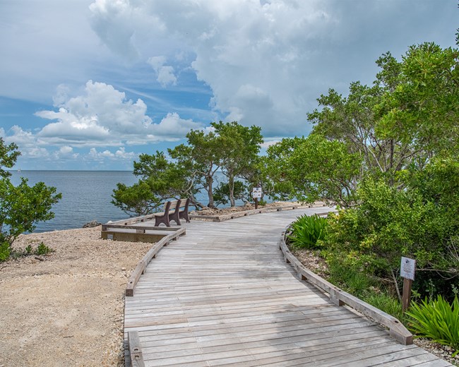 The Convoy Point jetty curving along turquoise Biscayne Bay