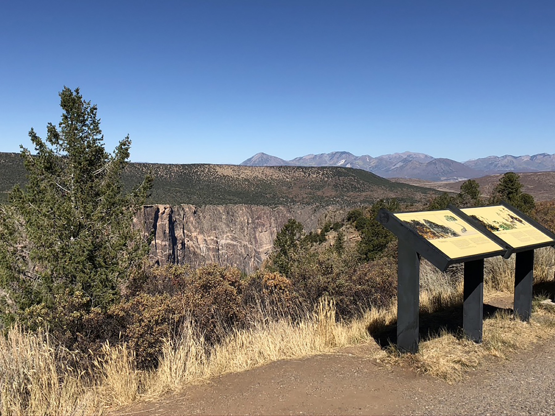 High Point overlook with canyon walls and mountains beyond