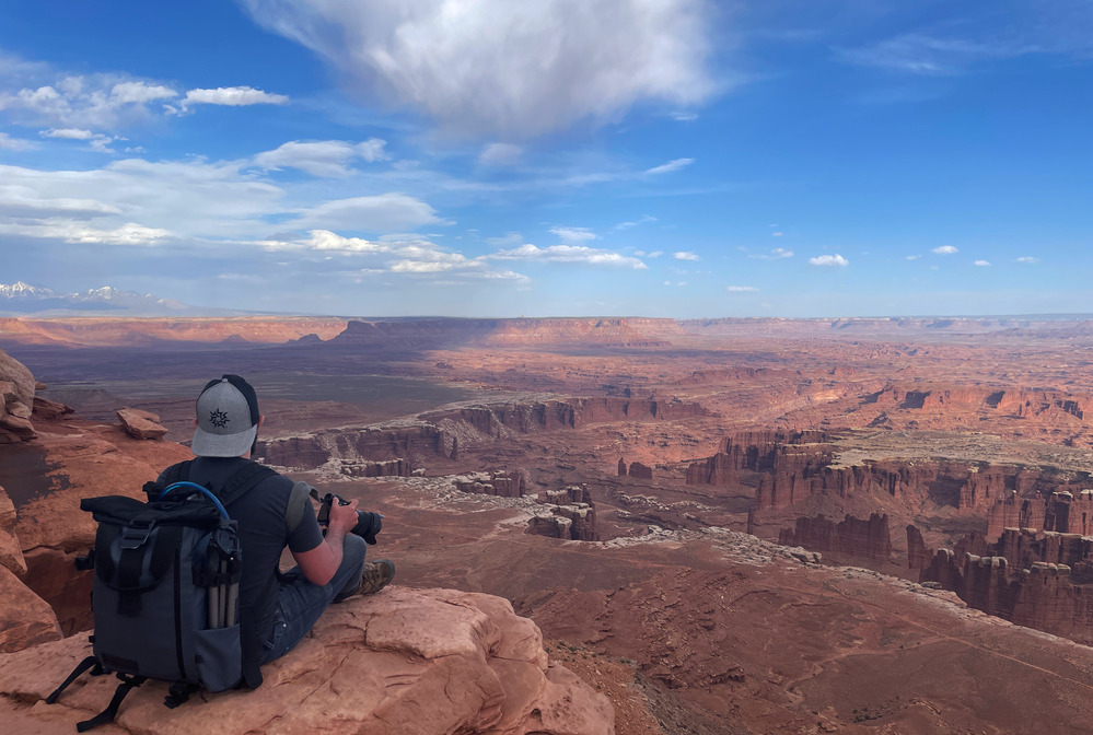 Visitors looking across the carved basins near Grand View Point
