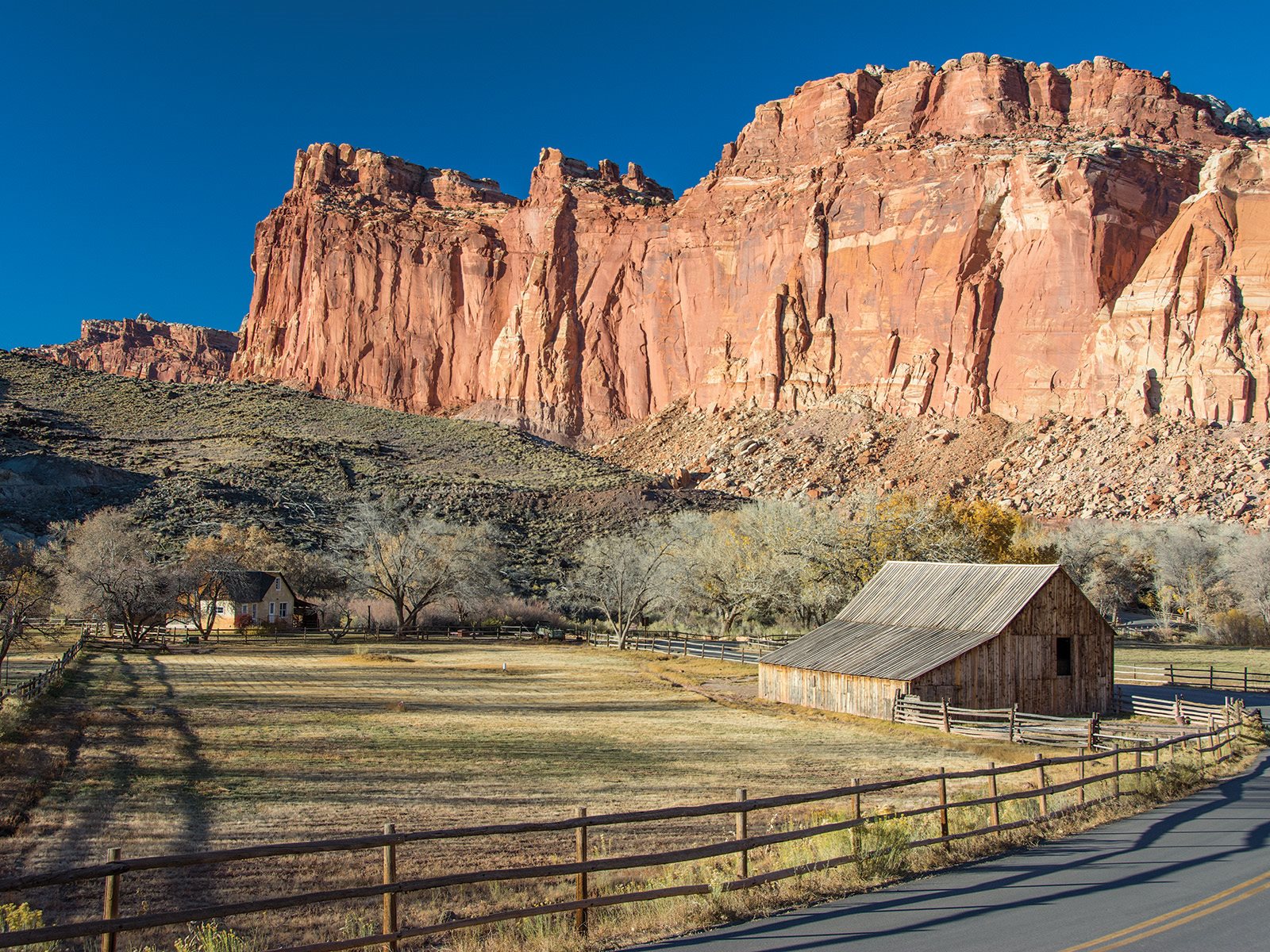 The Gifford House and Pendleton Barn below Capitol Reef cliffs