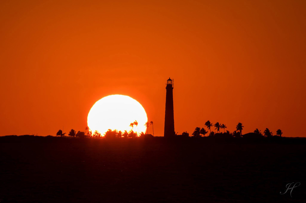 Loggerhead Key lighthouse silhouetted near sunset
