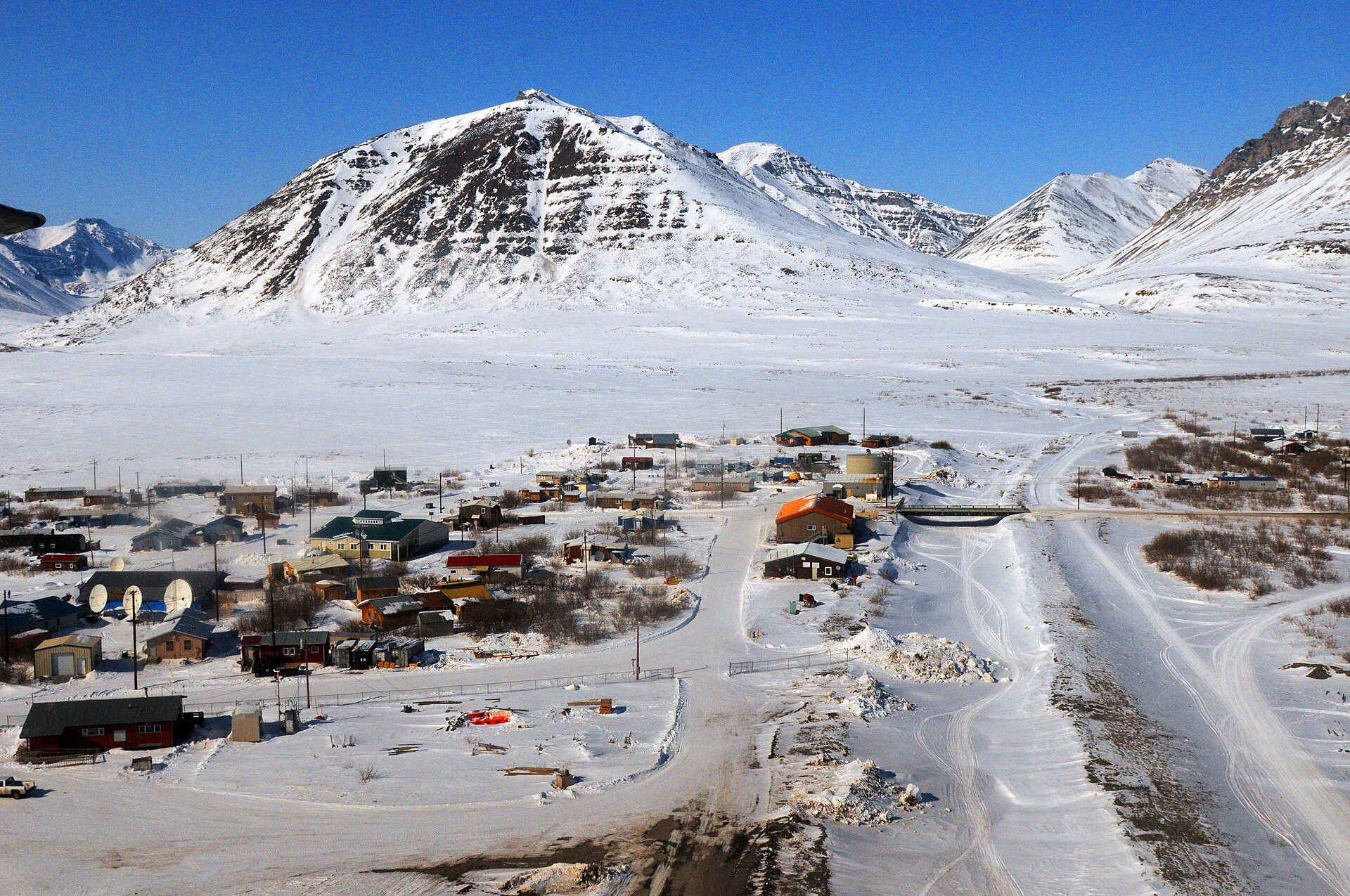 Anaktuvuk Pass village and tundra ridges seen from the air