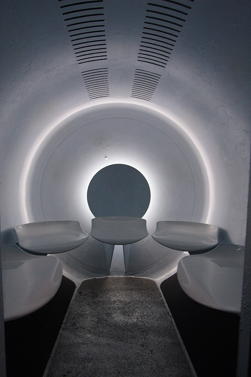 A compact tram car used for the ride to the top of the Gateway Arch