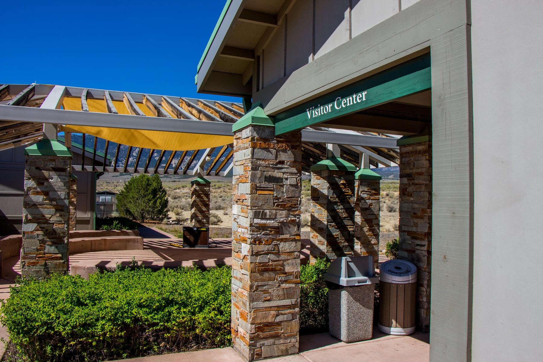 The Great Basin Visitor Center with mountains behind it