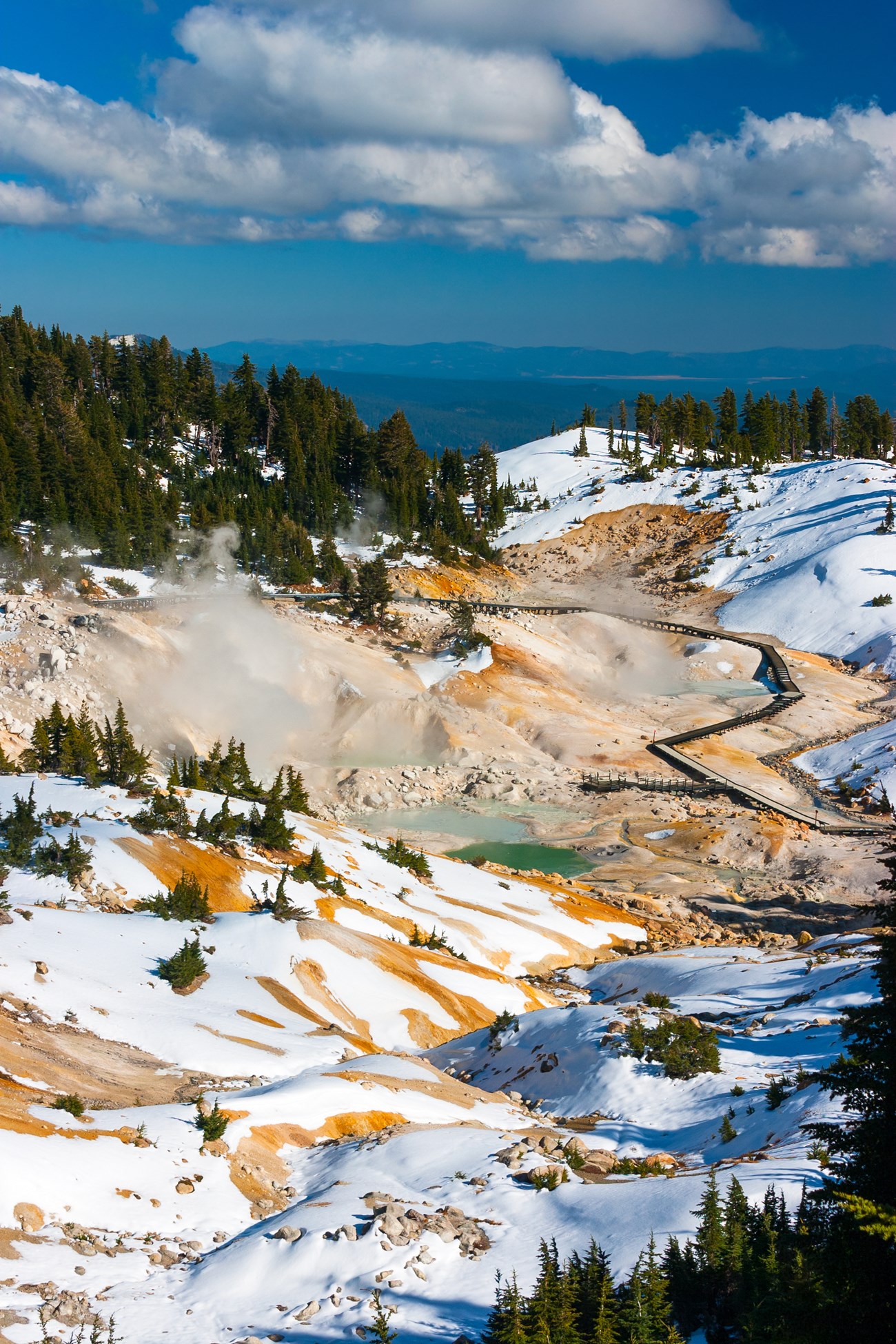 Boardwalk passing steam vents in Bumpass Hell