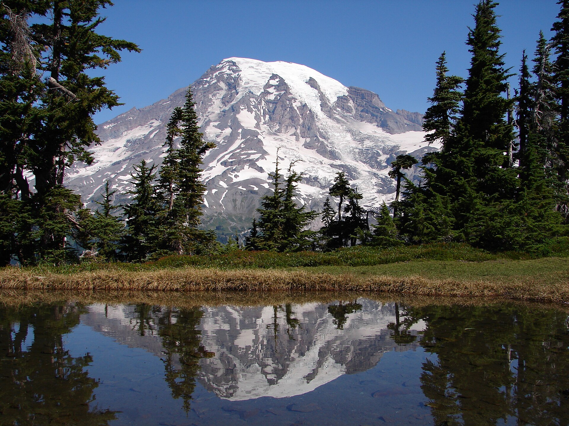 Mount Rainier reflected in still water at Reflection Lakes
