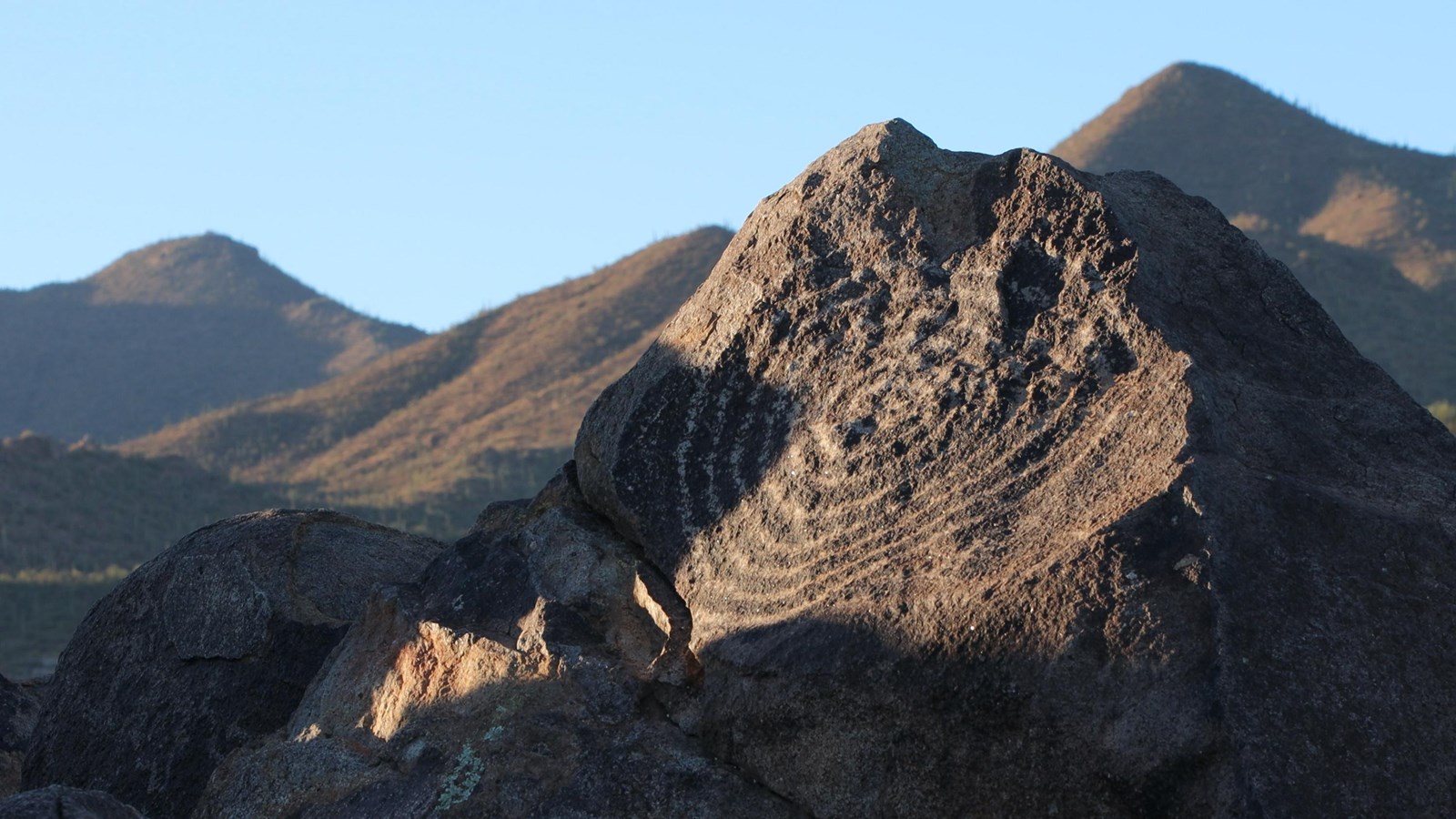 Petroglyph-covered rock at Signal Hill