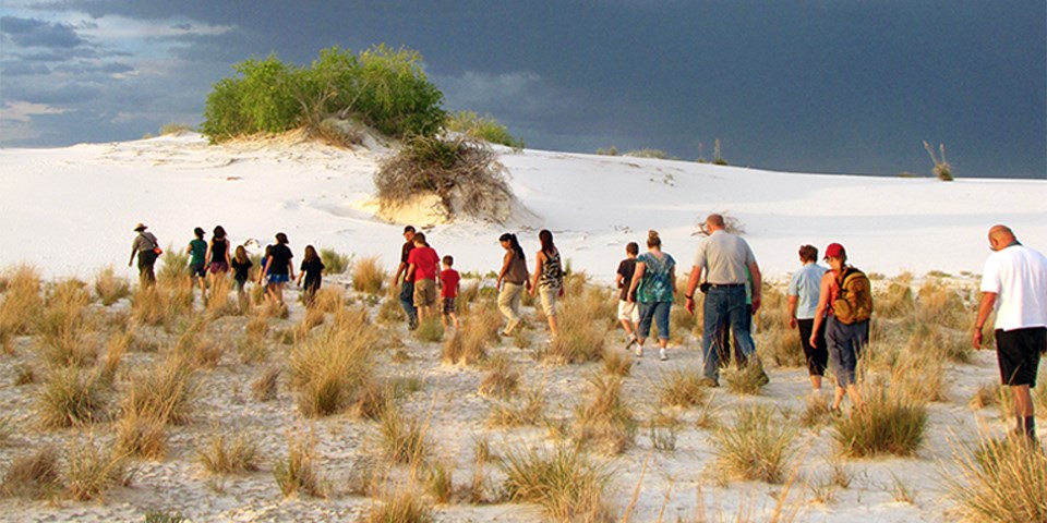 Sunset color over rippled gypsum dunes at White Sands
